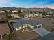 Aerial view of a single-story home and surrounding neighborhood at 311 Belfast St, Henderson, NV 89015