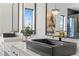 Elegant bathroom with double vanity, black sinks, and gold faucets at 311 Belfast St, Henderson, NV 89015