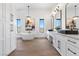 Bright bathroom with double vanity, soaking tub, and natural light at 311 Belfast St, Henderson, NV 89015