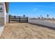 Modern gated entry to a new home with a neutral color scheme and desert landscaping at 311 Belfast St, Henderson, NV 89015