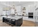 Modern kitchen with large island and stainless steel appliances at 311 Belfast St, Henderson, NV 89015