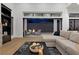 Living room with fireplace and sliding doors opening to backyard patio at 311 Belfast St, Henderson, NV 89015