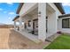 Covered patio with seating area and view of backyard at 311 Belfast St, Henderson, NV 89015