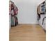 Bright walk-in closet featuring light wood floors at 311 Belfast St, Henderson, NV 89015