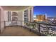 Night view of the city skyline and high-rise buildings from a condo balcony at 322 Karen Ave # 1001, Las Vegas, NV 89109