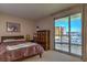 Spacious bedroom with city view and large window at 322 Karen Ave # 1001, Las Vegas, NV 89109