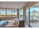 Living room with city views and access to balcony at 322 Karen Ave # 1001, Las Vegas, NV 89109