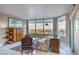 Elegantly furnished living room with stunning city views from large windows at 322 Karen Ave # 1001, Las Vegas, NV 89109