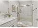 Clean bathroom with a walk-in shower, modern vanity, and tile floor at 355 Purple Sandpiper St, Las Vegas, NV 89138