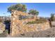 Community entrance with stone wall and Bristlecone sign at 355 Purple Sandpiper St, Las Vegas, NV 89138