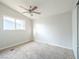 Spacious bedroom with ceiling fan and carpet at 3644 San Pascual Ave, Las Vegas, NV 89115