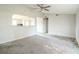 Living room with a ceiling fan and a view of kitchen at 3644 San Pascual Ave, Las Vegas, NV 89115