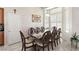 Bright dining room with a large table and window at 3940 Colonial Field Ave, North Las Vegas, NV 89031