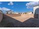 Backyard with a large patio and gravel at 406 Misterioso St, Henderson, NV 89011