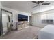 Main bedroom with large mirror, dresser and ceiling fan at 406 Misterioso St, Henderson, NV 89011