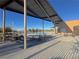 Community pool area with covered seating and picnic tables at 406 Misterioso St, Henderson, NV 89011