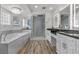 Elegant bathroom with double sinks, soaking tub, and glass shower at 43 Innisbrook Ave, Las Vegas, NV 89113