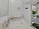 Modern bathroom with double vanity and marble countertops at 43 Innisbrook Ave, Las Vegas, NV 89113