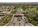 Gated entrance to an upscale community with manicured landscaping at 43 Innisbrook Ave, Las Vegas, NV 89113