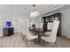 Elegant dining room with a live edge table and crystal chandelier at 43 Innisbrook Ave, Las Vegas, NV 89113