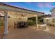 Covered patio with dining area and string lights at 43 Innisbrook Ave, Las Vegas, NV 89113