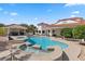 Inviting kidney-shaped pool with spa and expansive patio at 43 Innisbrook Ave, Las Vegas, NV 89113