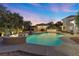 Lighted pool and spa at dusk, creating a serene ambiance at 43 Innisbrook Ave, Las Vegas, NV 89113