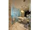 Modern bathroom with double vanity and glass shower at 4381 W Flamingo Rd # 2208, Las Vegas, NV 89103