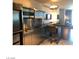 Modern stainless steel kitchen with breakfast bar at 4381 W Flamingo Rd # 2208, Las Vegas, NV 89103