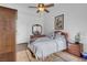 Charming bedroom with ceiling fan and built-in wardrobe at 4613 Golden Palomino Ln, North Las Vegas, NV 89032