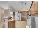 Spacious kitchen with stainless steel appliances and ample cabinetry at 4613 Golden Palomino Ln, North Las Vegas, NV 89032