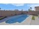 Relaxing rectangular swimming pool surrounded by a spacious patio at 4613 Golden Palomino Ln, North Las Vegas, NV 89032