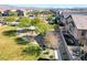 Aerial view of community with a park and pool at 4710 Frasers Owl Ave # 103, North Las Vegas, NV 89084