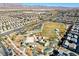 Aerial view of Tucana Pointe community park with playground and open space at 4710 Frasers Owl Ave # 103, North Las Vegas, NV 89084