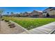 Landscaped green area in Tucana Pointe with a walking path at 4710 Frasers Owl Ave # 103, North Las Vegas, NV 89084