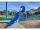 Fun playground with a large blue slide at 4710 Frasers Owl Ave # 103, North Las Vegas, NV 89084