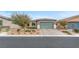 Charming single-story home with a two-car garage and desert landscaping for low maintenance at 5640 Akula Bay St, North Las Vegas, NV 89081