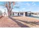 Updated single story home with new landscaping and large driveway at 6005 W Washington Ave, Las Vegas, NV 89107