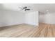 Spacious living room with light flooring and ceiling fan at 6005 W Washington Ave, Las Vegas, NV 89107