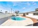 Enjoy this refreshing kidney-shaped pool in the backyard at 6005 W Washington Ave, Las Vegas, NV 89107