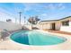 Beautiful kidney shaped pool with a large patio at 6005 W Washington Ave, Las Vegas, NV 89107