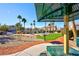 Community BBQ area with shaded tables and seating at 6529 Za Zu Pitts Ave # 102, Las Vegas, NV 89122