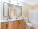 Updated bathroom with double vanity, wood cabinets, and bathtub at 6529 Za Zu Pitts Ave # 102, Las Vegas, NV 89122