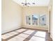 Bright bedroom with wood floors and large windows at 6529 Za Zu Pitts Ave # 102, Las Vegas, NV 89122