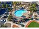 Community pool with surrounding landscaping and walkways at 6529 Za Zu Pitts Ave # 102, Las Vegas, NV 89122