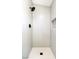 Modern shower with subway tile and hexagon floor tile at 6529 Za Zu Pitts Ave # 102, Las Vegas, NV 89122