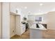 Modern kitchen with white shaker cabinets and quartz countertops at 6628 Silver Penny Ave, Las Vegas, NV 89108