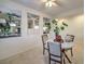 Well-lit dining area featuring a round table and built-in shelving at 6733 Violet Bluff Ct, North Las Vegas, NV 89084