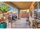 Backyard patio with seating area and outdoor kitchen at 6733 Violet Bluff Ct, North Las Vegas, NV 89084