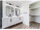 Double vanity bathroom with walk-in closet access at 6808 Rose Petal Ave, Las Vegas, NV 89130